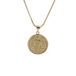 Gold Saint Benedict medal pendant necklace with zircon inlay on a clean white background