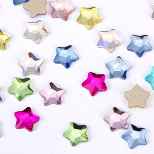 Macro shot of colorful star-shaped rhinestones for nail art and DIY decoration