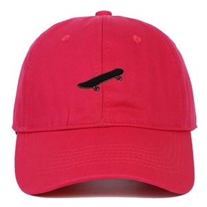 Detail shot of rose red cotton baseball cap with skateboard embroidery and vent holes