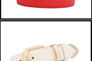 Detailed close-up of red and white lychee leather belts with golden alloy pin buckles