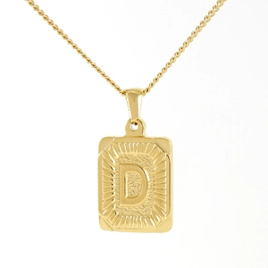 Detailed view of 18K gold-plated stainless steel rectangular pendant with letter D engraving
