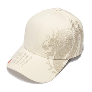Classic cream-colored cotton baseball cap featuring gold dragon embroidery and calligraphy
