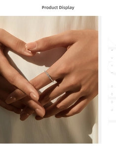 Detailed view of elegant moissanite row ring in sterling silver worn on hand