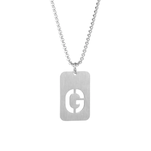 Macro shot of silver titanium steel G-letter hollow pendant necklace with military tag design