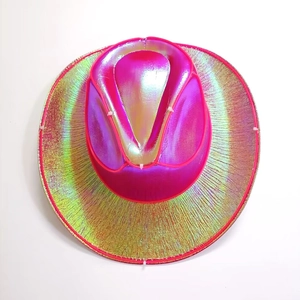 Close-up of LED neon lines and metallic laser texture on hot pink cowboy party hat
