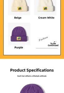 Detail of knitted beanie textures in beige, cream and purple with woven 091 labels