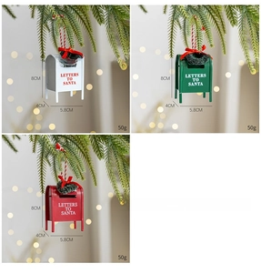 Close-up of three Letters to Santa mailbox ornaments with festive wreaths in red and green