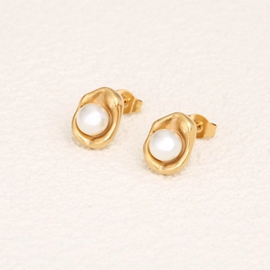 Golden irregular pea-shaped stud earrings featuring a round white pearl for women