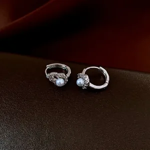 Elegant silver huggie hoop earrings with white pearl and sparkling zircon hollow gourd design