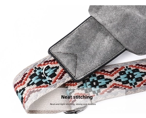 Detail of colorful ethnic embroidery strap with neat stitching on durable fabric