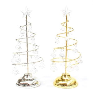 Golden and silver spiral Christmas trees with crystal pendants on a white background