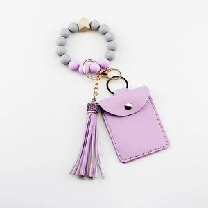 Porte-clés Bracelet en Perles de Silicone Porte-cartes en Cuir PU Pendentif Gland Fermoir en Alliage Bijoux de Mode Femme