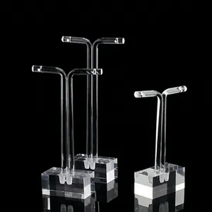 Three-piece set of transparent acrylic T-shaped earring stands with weighted rectangular bases