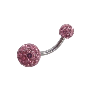 Detail shot of silver curved barbell navel ring with sparkling pink rhinestone spheres