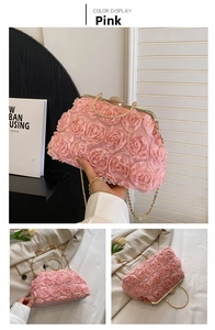 Detail of pink bridal clutch featuring 3D floral rosettes and rhinestone clasp closure