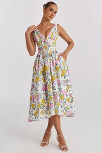 Detailed view of summer floral maxi dress with deep V-neck and slim fit waist design