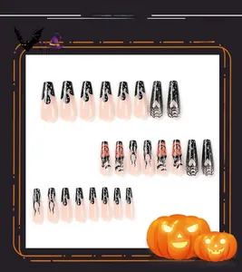 Detail of Halloween coffin nails featuring black flame, pumpkin and spider web designs