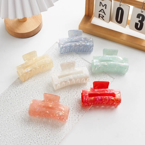 Minimalist square candy colored hair claws in acetate marble finish for women
