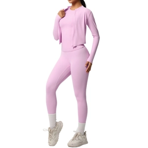 Three-piece light purple yoga set with long sleeve zip jacket and slimming leggings