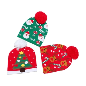 Three-piece Christmas knit beanies featuring Santa, reindeer, and pom-poms on top