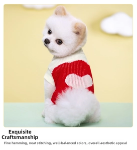 Detailed knit texture of red dog sweater with white heart pattern and ribbed turtleneck