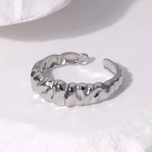 Minimalist irregular textured silver stainless steel open ring with glossy finish