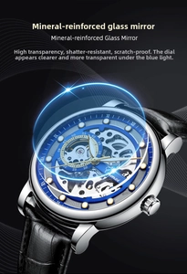 Macro view of mineral-reinforced glass mirror and hollow dial on automatic watch