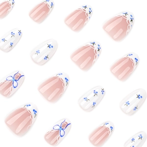Short almond press-on nails with blue floral patterns and French bow accents