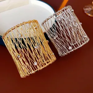 Gold and silver woven metal mesh bracelets with zircon accents shown at a 45-degree angle