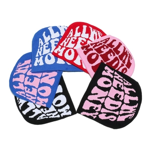 Y2K streetwear knit beanie featuring All We Need Is Honey jacquard text in multiple colors