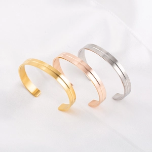 Minimalist stainless steel C-shaped cuff bracelet with geometric groove in three colors