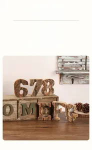 Close-up of vintage natural wood letters with tree bark for DIY home decoration