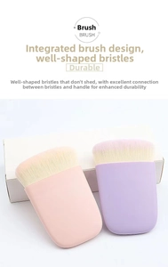 Detailed view of makeup brushes with dense bristles and integrated pink and purple handles