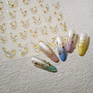 Detail of gold starry line nail stickers with five-pointed stars and meteor trails