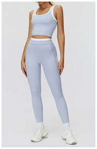 Close-up of lilac ribbed high-waisted yoga leggings with precision stitching details