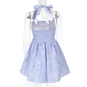 Detail of lavender jacquard halter dress showing back elastic smocking and tie-neck design