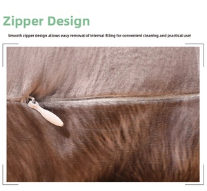 Detail of invisible zipper on brown plush pillow showing easy removal for washing