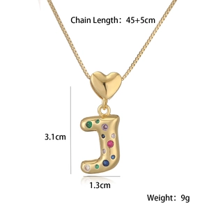 Detail of 18K gold letter J pendant with colorful stones and chain measurements