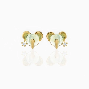 Macro detail of elephant stud earrings with green resin and 18K gold plated copper