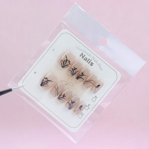 Orchid galaxy ink cat-eye press-on nails with butterfly patterns on elegant pink base
