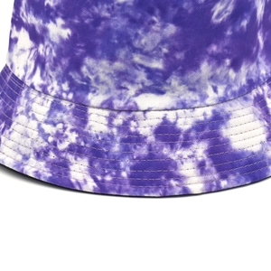Close-up of purple tie-dye bucket hat showing reinforced stitching and fabric texture