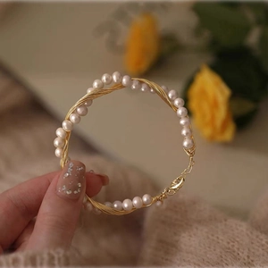 Handmade 14k gold filled braided freshwater pearl bracelet with adjustable lobster clasp