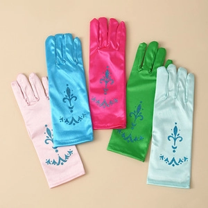 Detail of colorful satin gloves with snowflake totem printing for costume parties