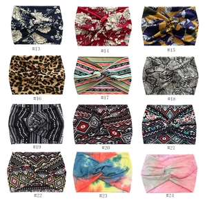 Detailed catalog of twelve bohemian knotted headbands with diverse floral and animal prints