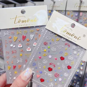 5D embossed nail art stickers featuring colorful sunflowers, neon hearts and smiley faces