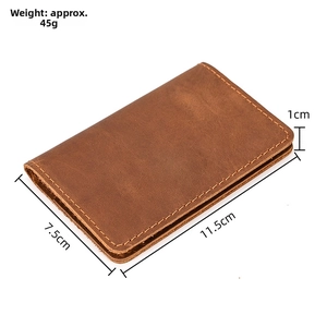 Detail showing vintage brown crazy horse leather wallet with neat edge stitching