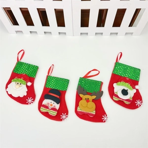 Set of 4 mini Christmas stockings with Santa, snowman, reindeer and polar bear motifs