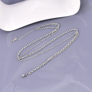 Three-layer silver stainless steel necklace with multi-chain design and K18 tag