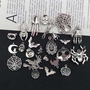 Assorted silver Halloween metal charms including skulls, bats and pumpkins for DIY jewelry