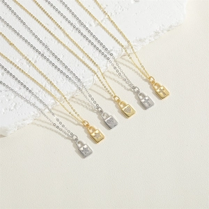 14K gold plated padlock pendant necklace with zircon star heart and cross motifs